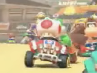 Toad driving in a Rally Kart